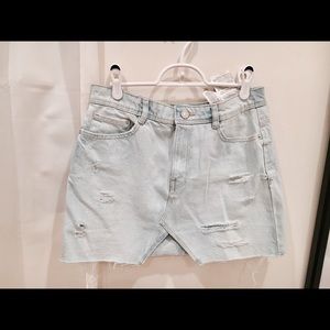 Light washed denim mini skirt